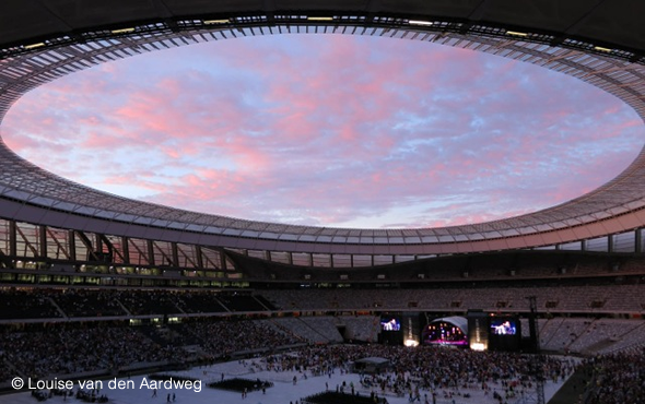 The dusk sky as seen through the stadium