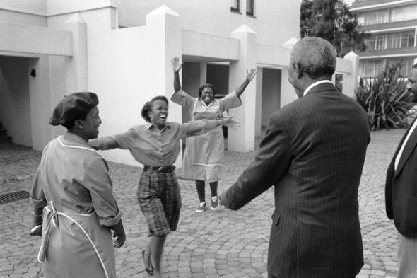 First Encounter, Johannesburg, 1994. Photo © George Hallett. “That picture with the women running towards Mandela, which I call ‘First Encounter’ – this was the first time they had actually seen him close up. And it was an incredible experience, because for the first time I saw the whole country, and the joy and the hope that people had. My God, I thought – it’s finally about to end, this crappy system of apartheid.” – George Hallett. Read more about Hallett in The photographer who showed Nelson Mandela to the world at Africa is a Country.