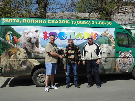 LAEO Ukraine Director Lionel de Lange, Taigan Safari Park truck driver, and meat supplier preparing for delivery to 62 starving lions and tigers