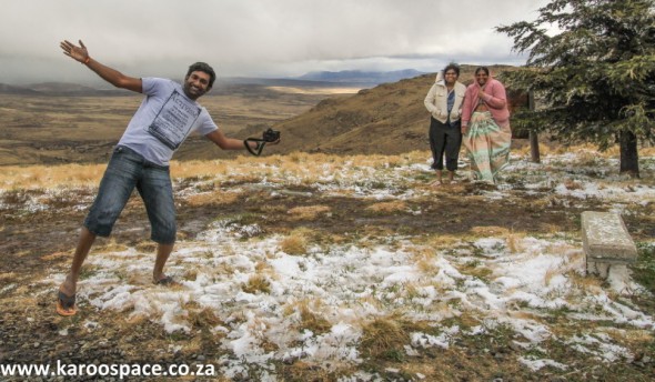 Gauteng overlanders jump out of their heated cars and play like children.