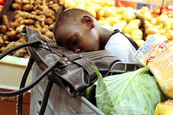 Blessing, sleeping on his mom's bag in Durban