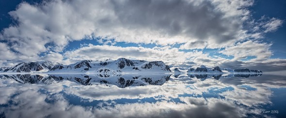 Mirror-like water and clouds