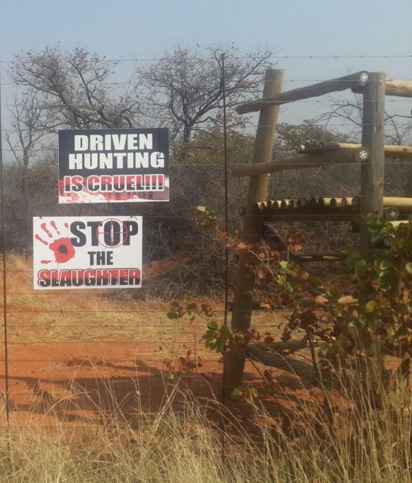 Protest signs outside the Braam Farm