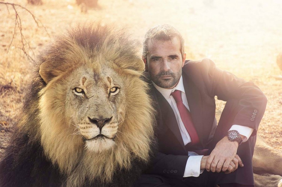 Kevin Richardson in an ad with a lion