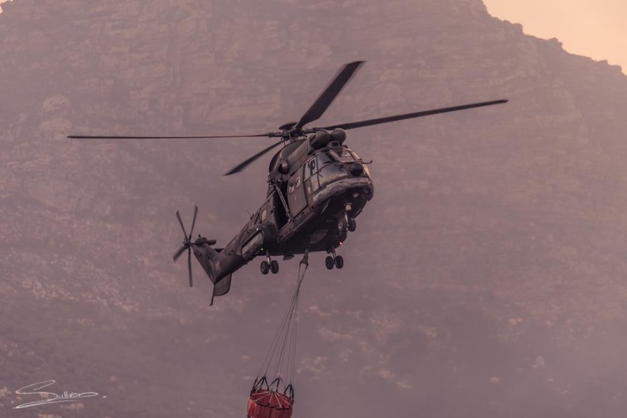 Fire helicopter with mountain