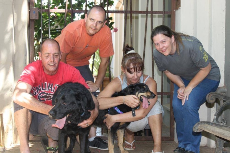 Misty and Stalker's original family pictured here with Marilyn and Bruce (their new humans).