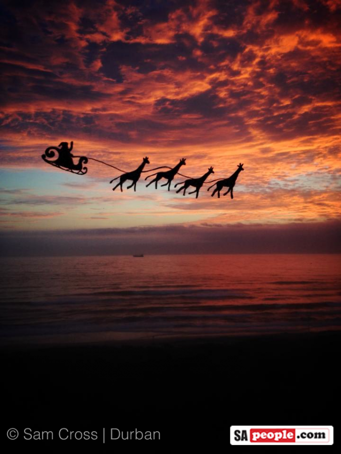 Santa pulled by giraffes