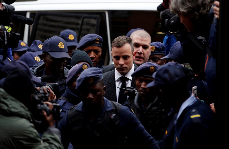 Former Paralympian Oscar Pistorius arrives to be sentenced for murder of his girlfriend Reeva Steenkamp, at the Pretoria High Court, South Africa June 13,2016. REUTERS/Siphiwe Sibeko