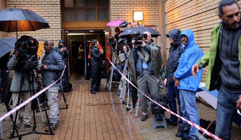 Members of the media wait for the arrival of former Paralympian Oscar Pistorius, to be sentenced for murder of his girlfriend, Reeva Steenkamp at the Pretoria High Court, South Africa June 13,2016. REUTERS/Siphiwe Sibeko