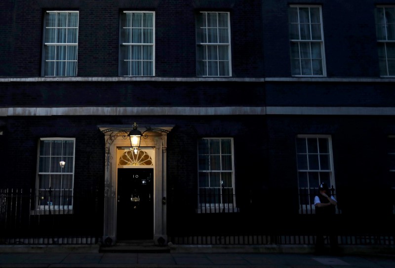 A light shines outside Number 10 Downing Street, as votes are counted for the EU referendum, in London, Britain June 24, 2016.       REUTERS/Stefan Wermuth