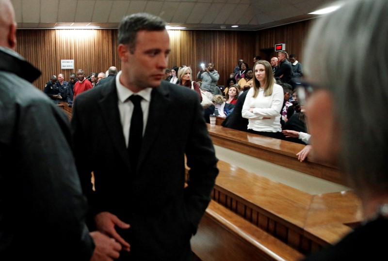 Sister Aimee Pistorius looks on as Olympic and Paralympic track star Oscar Pistorius leaves the court after his sentence hearing at the North Gauteng High Court in Pretoria, South Africa, July 6, 2016. REUTERS/Marco Longari/Pool