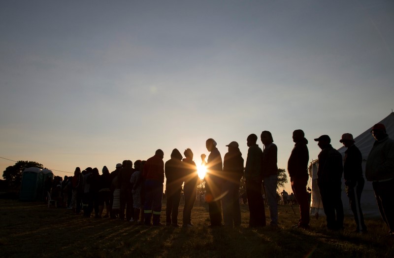 People queue at a voting station during South Africa's local government elections in Umlazi, Durban, South Africa, August 3, 2016. REUTERS/Rogan Ward