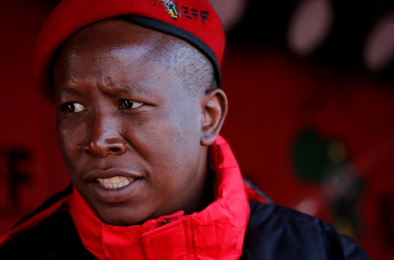 Julius Malema, the firebrand leader of South Africa's Economic Freedom Fighters (EFF) looks on before addressing his supporters during his campaign, ahead of the August 3 local government elections, in Etwatwa, a township near Benoni, South Africa. July 27,2016. REUTERS/Siphiwe Sibeko.