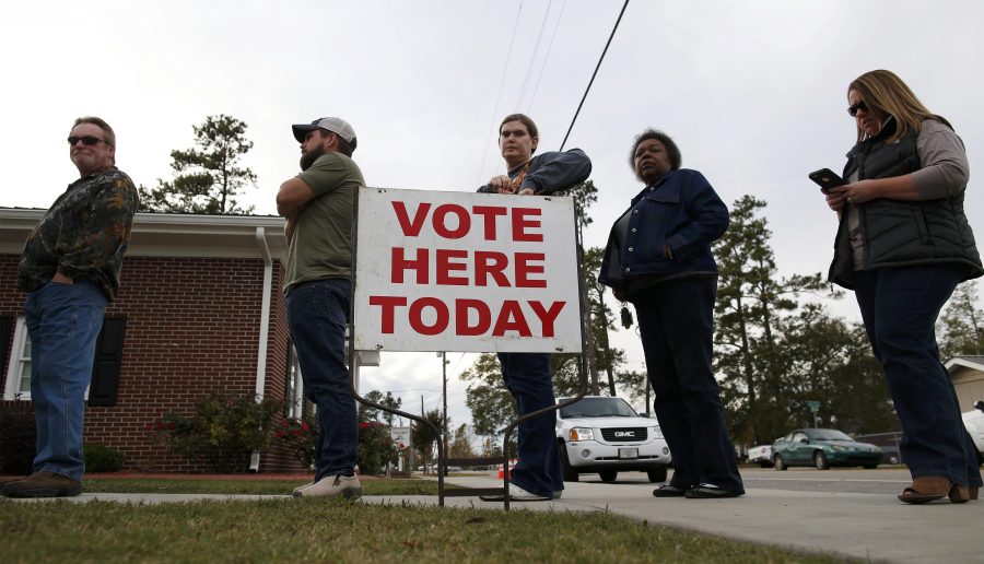 People wait in line to cast their ballots at the Aynor Town Hall during the U.S. presidential election in Aynor, South Carolina, U.S. November 8, 2016. REUTERS/Randall Hill