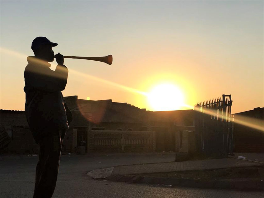 Armed with trumpets, S. African men blow aways street crime against women