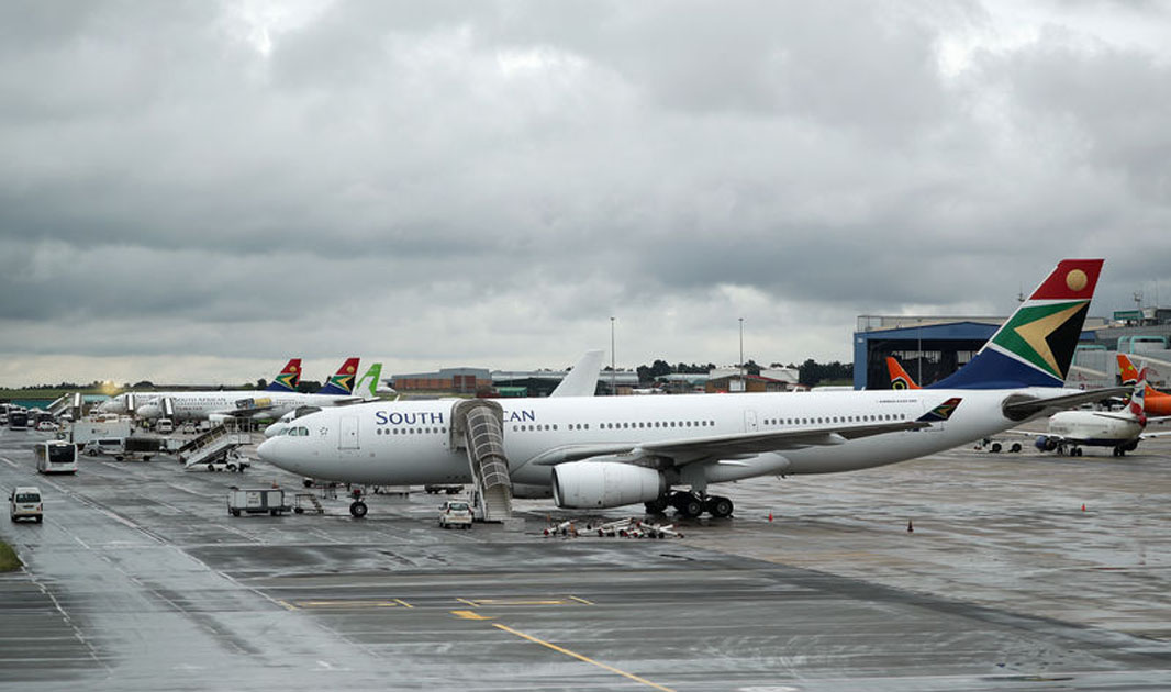 SAA aircraft stand on the runway at O.R. Tambo International Airport in Johannesburg