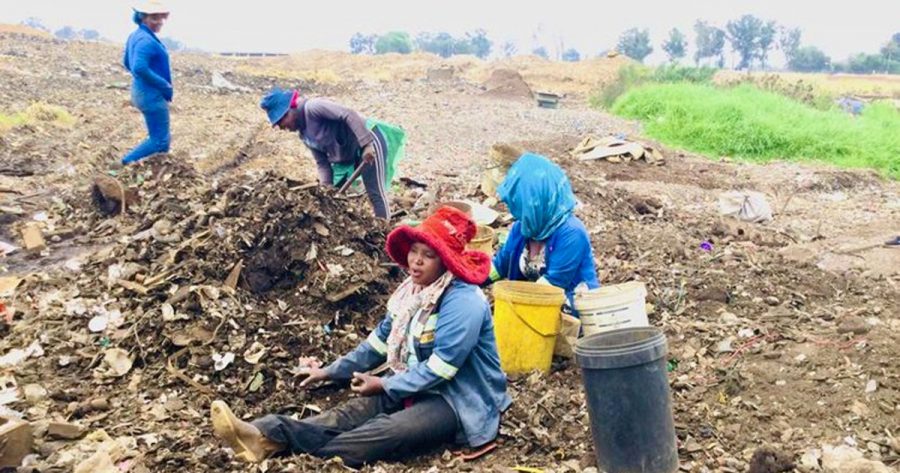 women work metal dump south africa