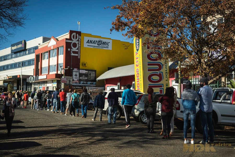 south africans queue alcohol bottle stores