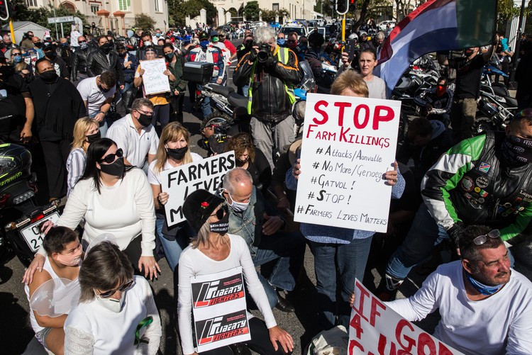 Hundreds of people, many on bikes, protested outside Parliament on Saturday morning against farm murders. Photo: Ashraf Hendricks