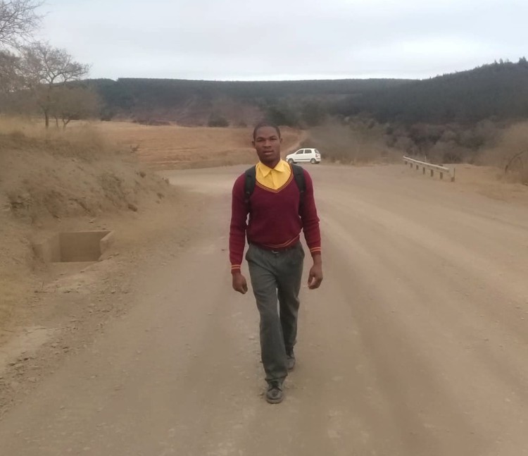 Grade 11 learner Zwelakhe Mnomiya walks approximately 11 kilometres to his high school in rural Kranskop because the KwaZulu-Natal education department says there’s not enough money to provide him and a dozen other learners from his village with transport. Photo: Supplied