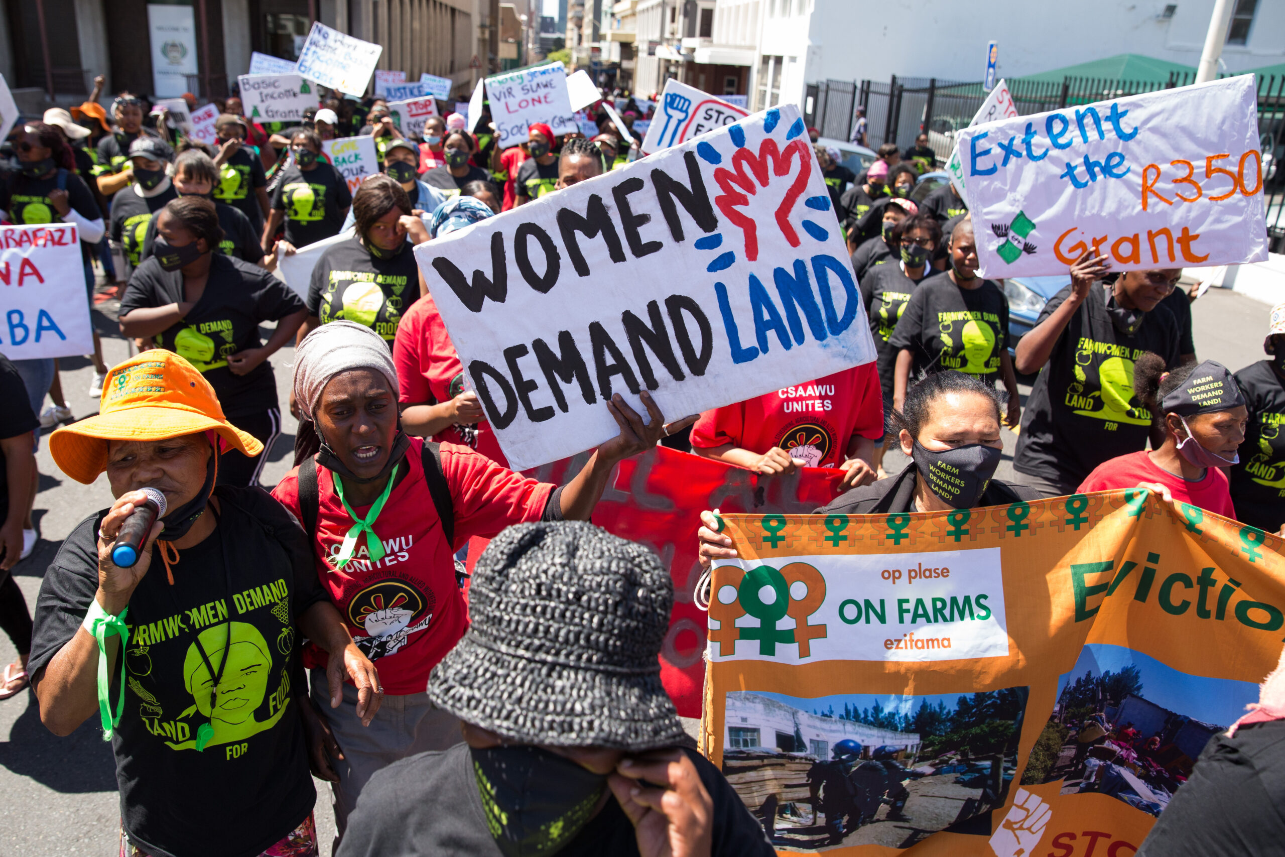 About 150 farm workers and supporters marched to Parliament to hand over a memorandum demanding an urgent meeting with Minister Thoko Didiza on farm women’s land issues and needs. The march was held to mark International Rural Women’s Day and and World Food Day. Photos: Ashraf Hendricks