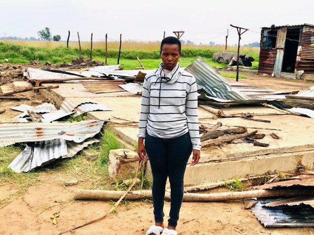 Sinoxolo Nwazi standing on the site of her demolished home. Photo: Kimberly Mutandiro