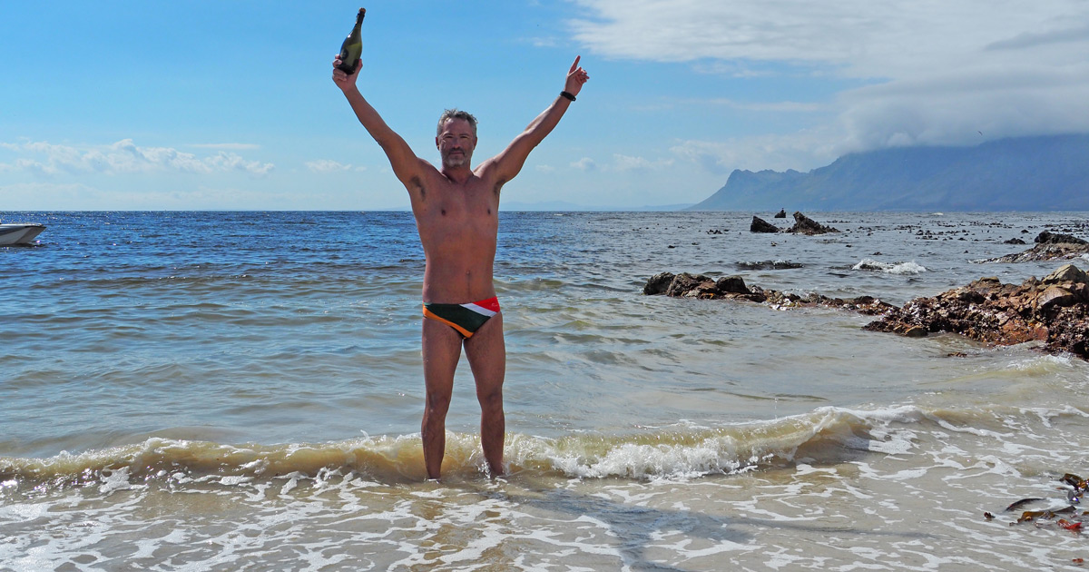 Ryan Stramrood celebrating after his record-breaking False Bay Crossing.