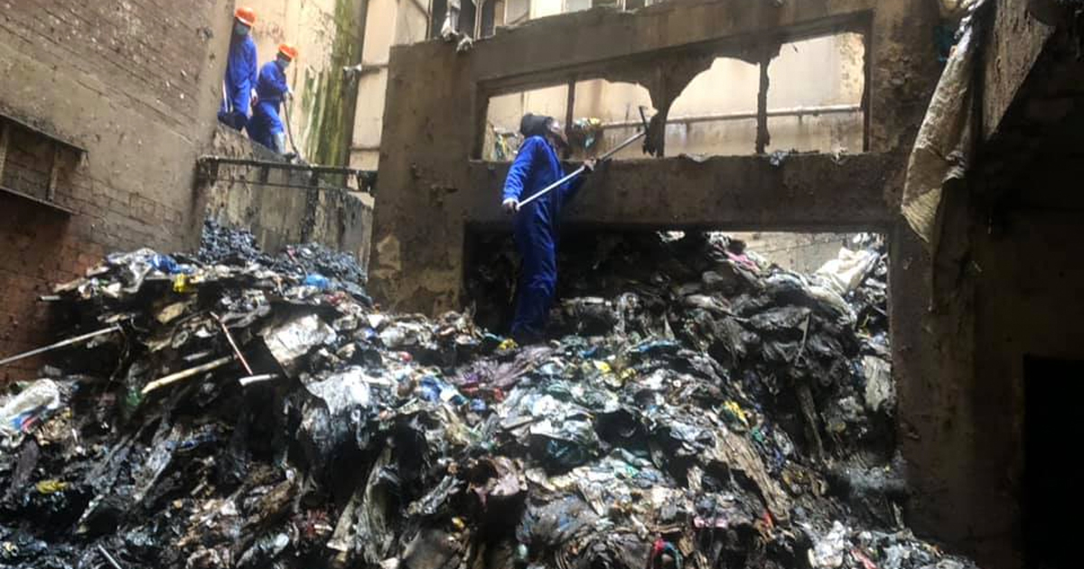 Hillbrow residents move nearly 500 tons of trash from their derelict building