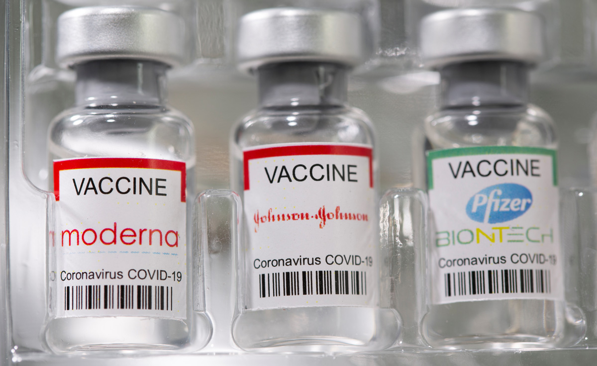 Vials labelled "Moderna, Johnson&Johnson, Pfizer - Biontech coronavirus disease (COVID-19) vaccine" are seen in this illustration picture. REUTERS/Dado Ruvic