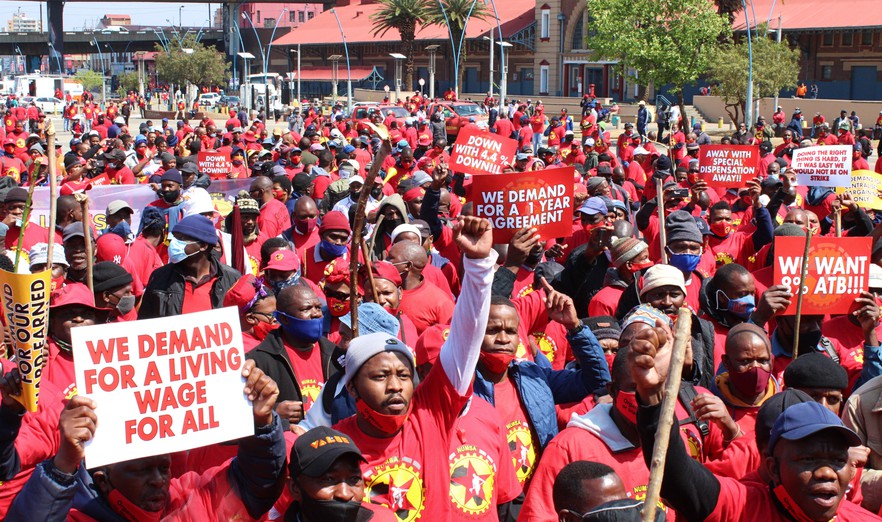 Hundreds of NUMSA workers marched from the Mary Fitzgerald Square to the Metals Engineering Industries Bargaining Council office in Marshalltown to hand over the memorandum of their demands on Tuesday. It was part of the national strike by steel engineering workers who are demanding an 8% wage increase, among other things. Photo: Masego Mafata