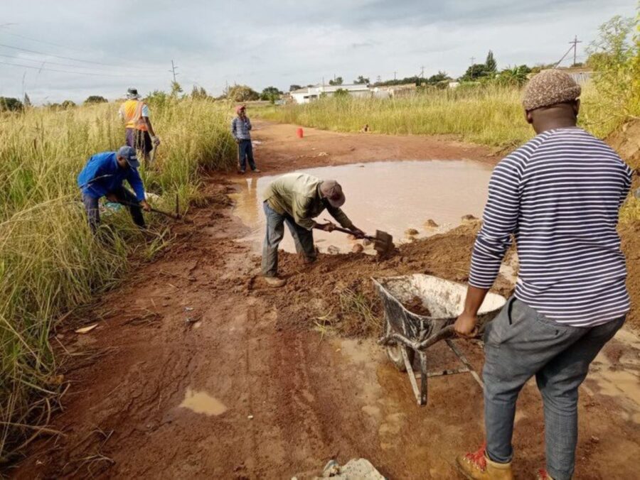 Villagers fix giant potholes themselves