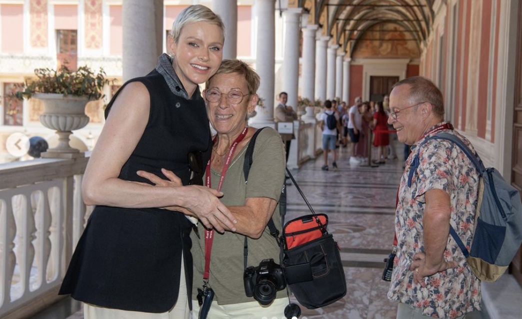 Princess Charlene Delights Tourists at Monaco Palace with Surprise Appearance