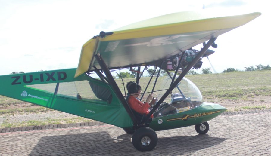 Minister Creecy tests out one of the Bat Hawk Light Aircraft