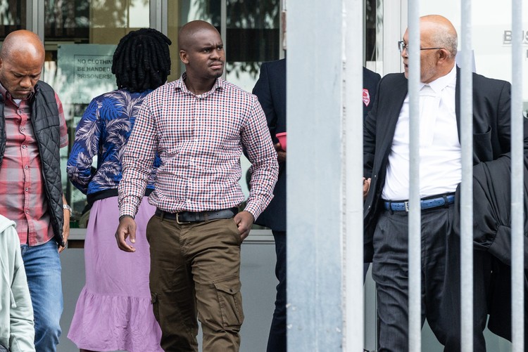 City of Cape Town law enforcement officer Luvolwethu Kati leaving the Wynberg Magistrates Court on Thursday where his trial began. He is accused of shooting and killing a man who was homeless while on duty. Photo: Ashraf Hendricks