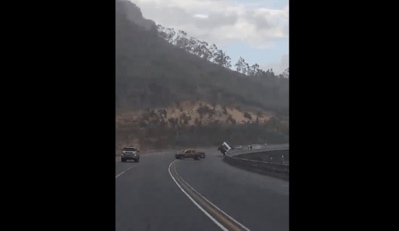 Cape winds blow over a vehicle at the Huguenot Tunnel