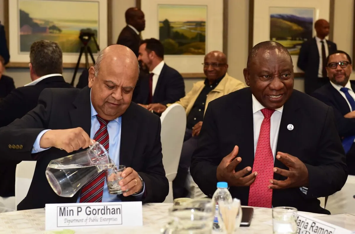 Former finance minister Pravin Gordhan and president Cyril Ramaphosa.