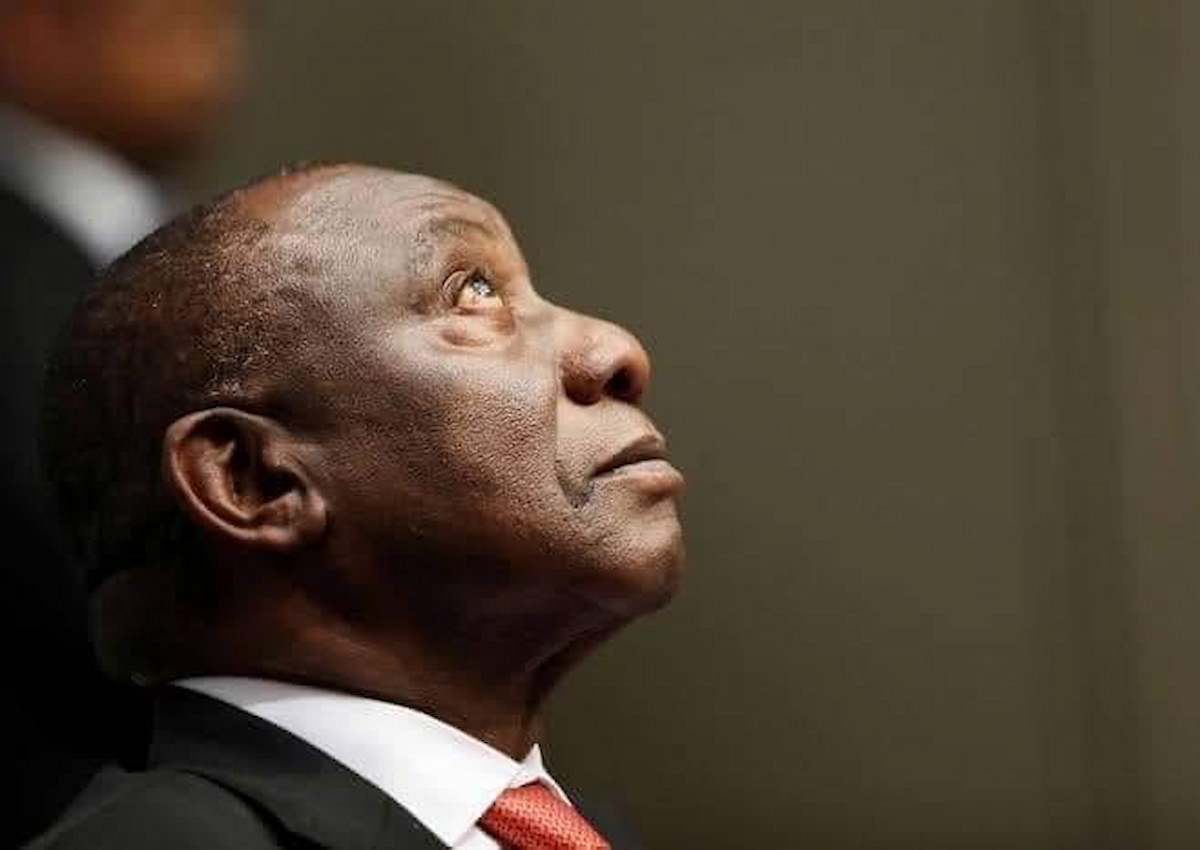 President Cyril Ramaphosa looking up at the sky, in image that accompanies story about Tembisa Hospital corruption