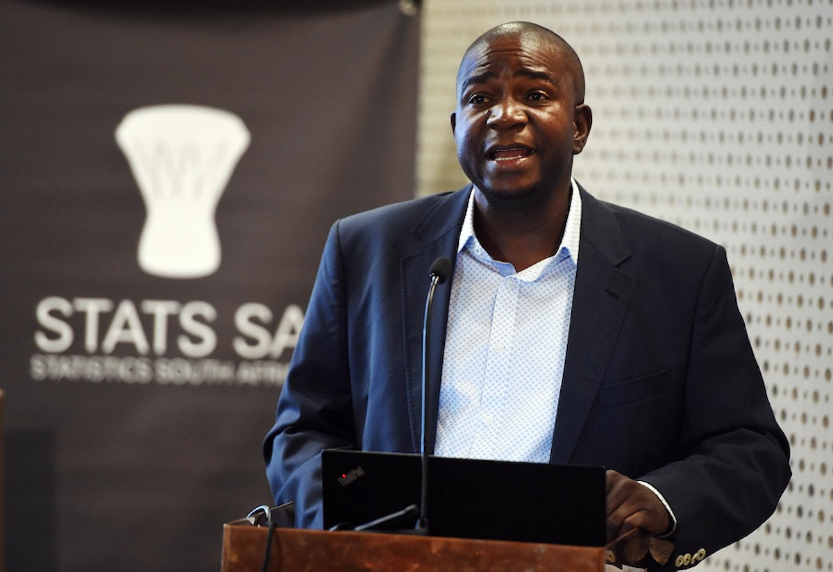 Statistician-General, Risenga Maluleka, speaking at a podium, with Stats SA logo in show.. This image accompanies a story about the popular surname 2024