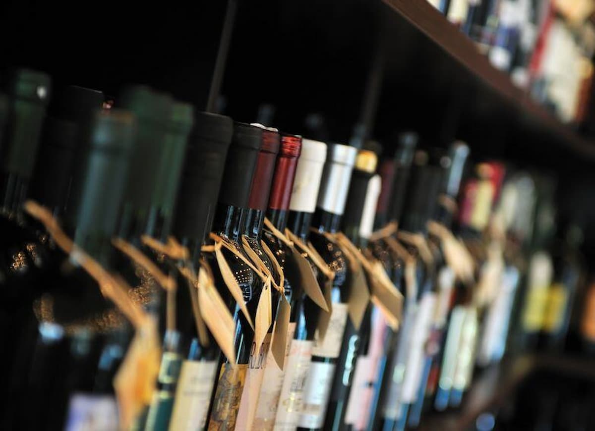 This image depicts while bottles on a shelf, to help illustrate a story about legal drinking age in South Africa https://creativecommons.org/licenses/by-nc/4.0/