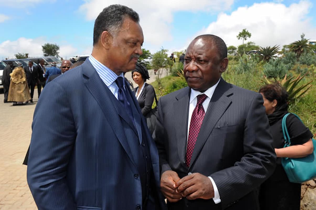 Jesse Jackson and then-ANC deputy president Cyril Ramaphosa at the funeral service of former president Nelson Mandela on 15 December 2013. This image accompanies an article about the death of Jesse Jackson and his historical ties to South Africa