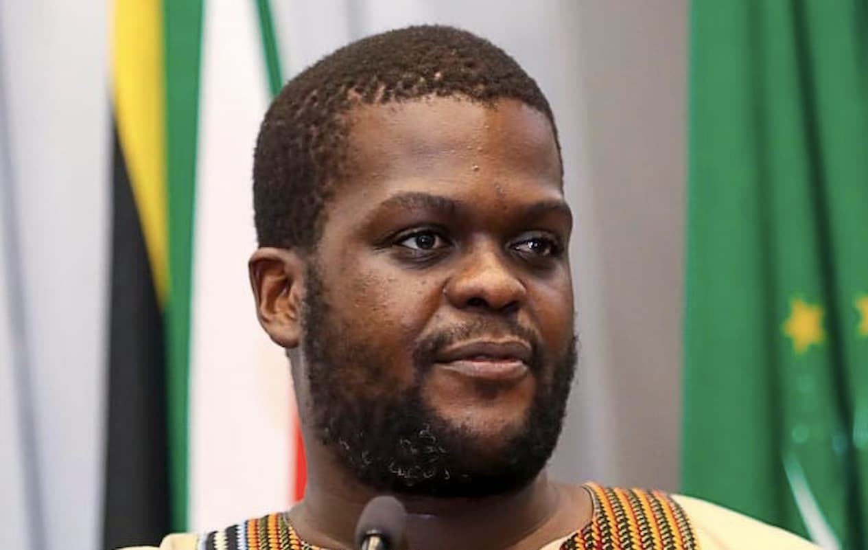 Head and shoulders picture of Vukosi Marivate in front of a microphone. This image accompanies an article about Marivate being nominated to join a top United Nations AI panel